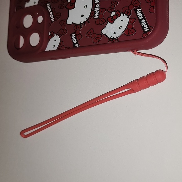 Brand new Apple IPhone 15 Pro Hello Kitty Silicone Phone case w. Wrist strap - Picture 7 of 10